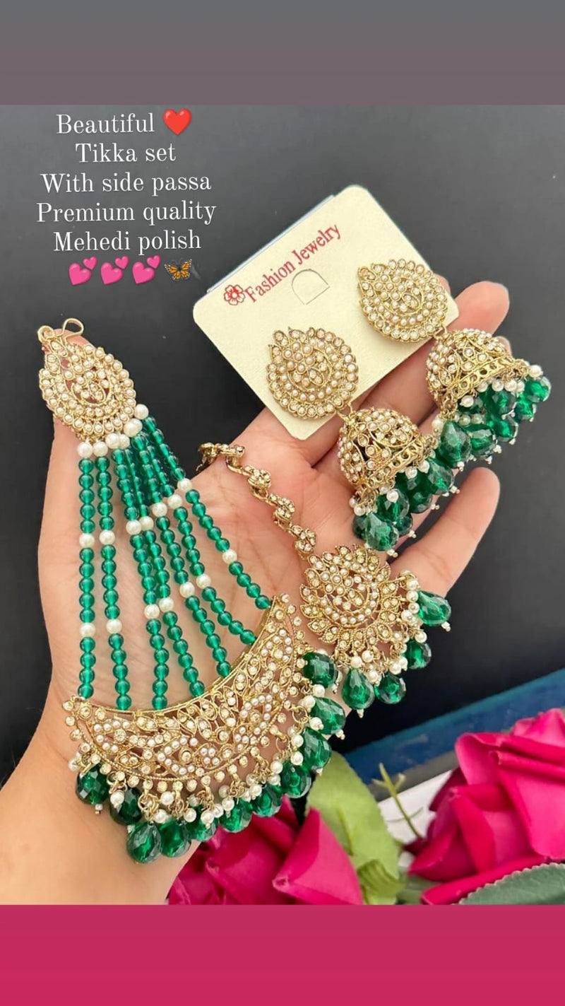 The Set Includes A Tikka  And A Pair Of Jhumka With Side Passa