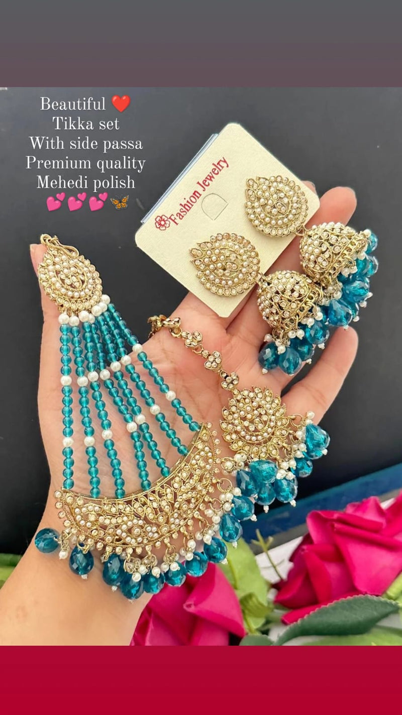 The Set Includes A Tikka  And A Pair Of Jhumka With Side Passa