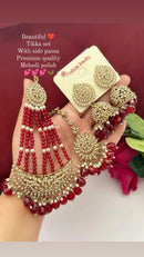 The Set Includes A Tikka  And A Pair Of Jhumka With Side Passa