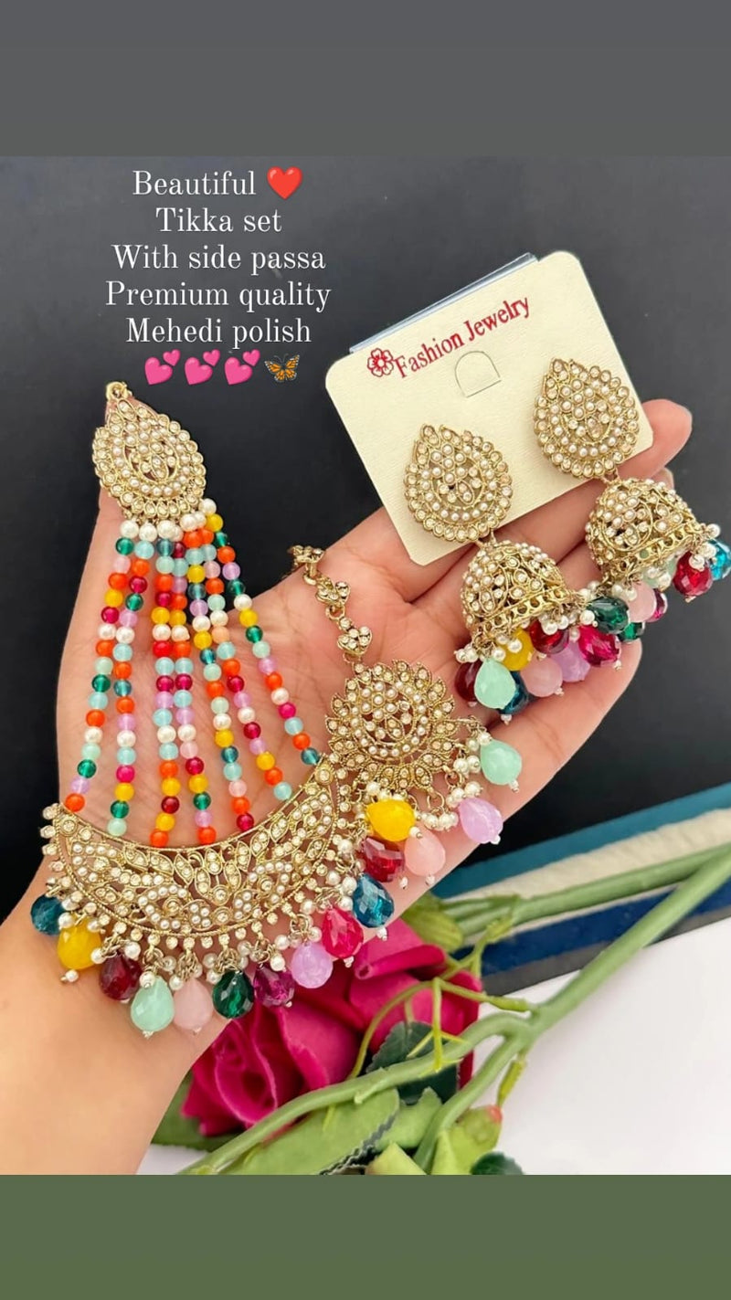 The Set Includes A Tikka  And A Pair Of Jhumka With Side Passa